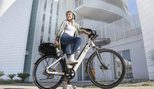 A woman riding a Fiido C11 Pro electric bike