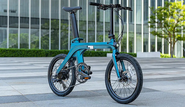 The Fiido X electric bike parked in a modern cityscape