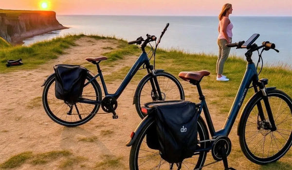 A woman is riding a Fiido C11 Pro lightweight electric bike while out on a trip.